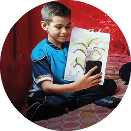 fotografia de nino beneficiado por proyectos de educacion de UNICEF